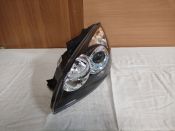 Фара левая Hyundai/Kia 1EL 010 146-02 92102 2R000